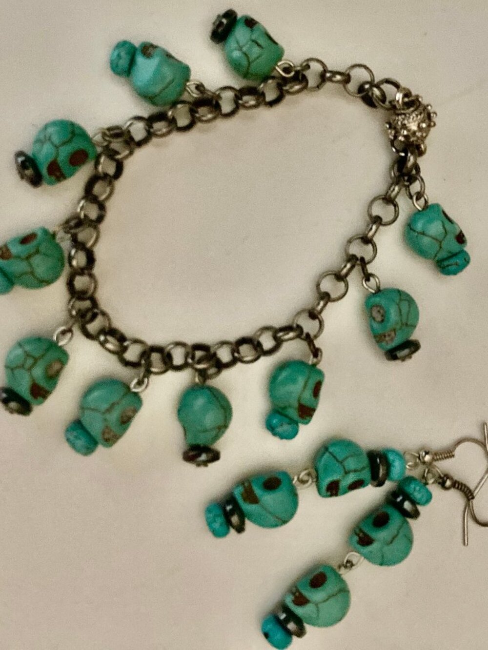 ONE OF A KIND SKELETON PIERCED EARRINGS AND MATCHING BRACELET W/MAGNETIC CLASP
